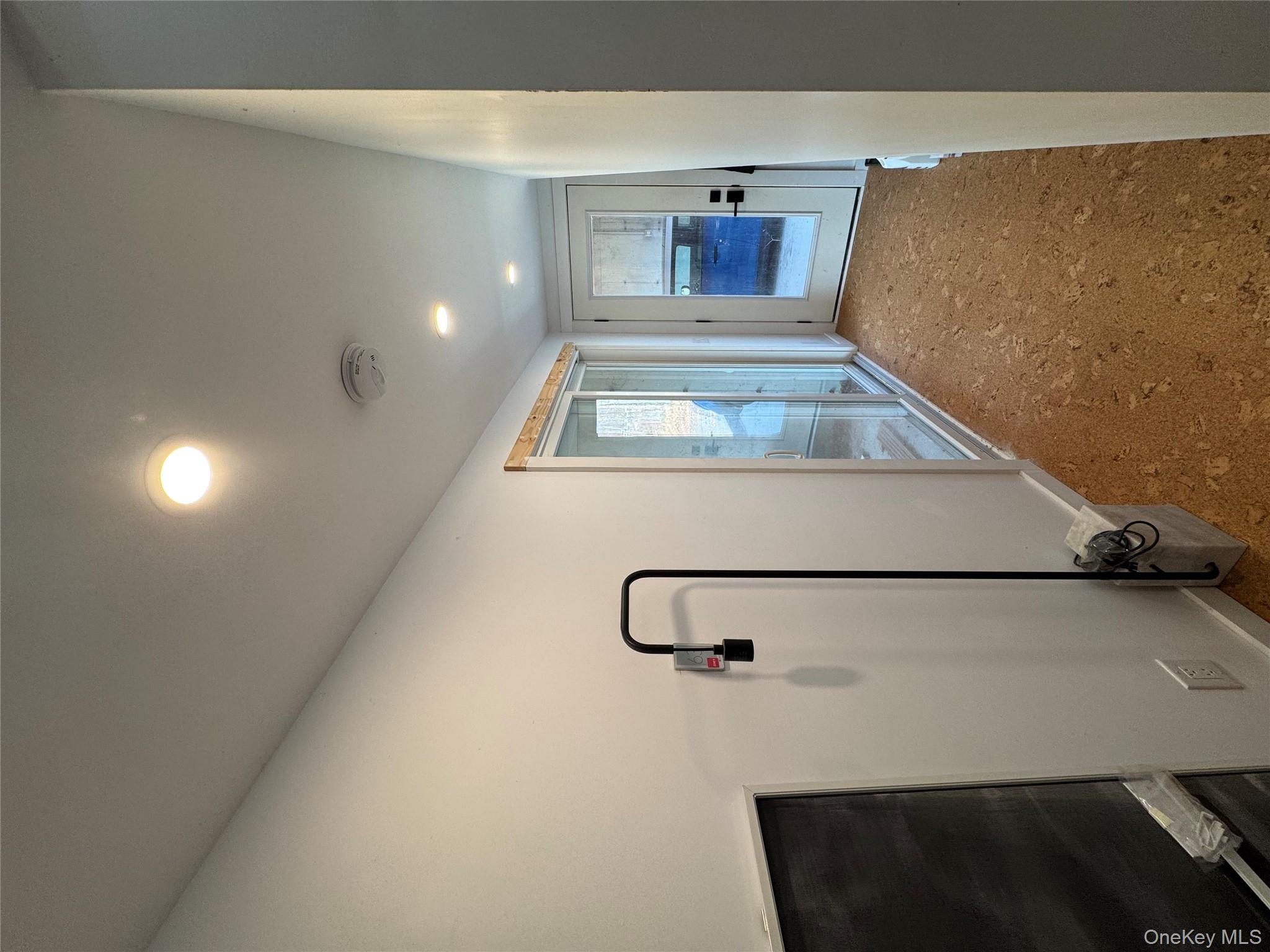 40 Pioneer Road Gardiner, NY 12525 - Photo 9 of 24 a view of a room with large windows and cabinet