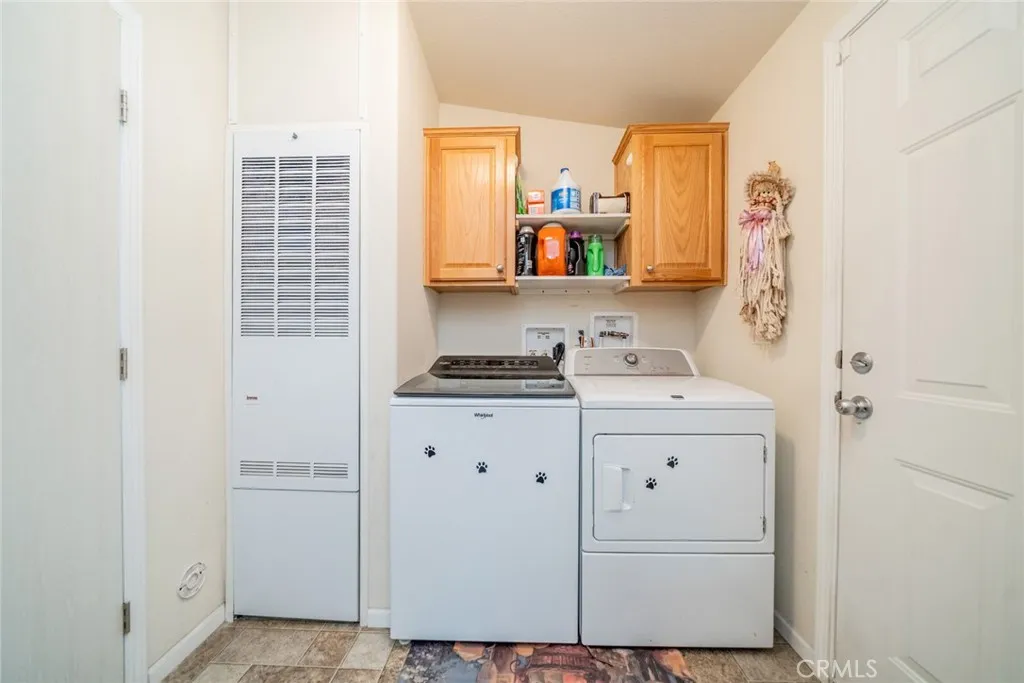 22241 Nisqually Road, Unit 153 Apple Valley, CA 92307 - Photo 30 of 55 a bathroom with a sink and a mirror