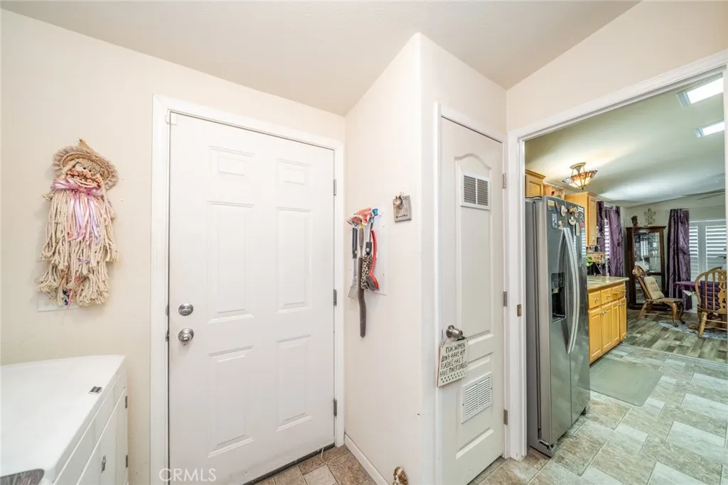 22241 Nisqually Road, Unit 153 Apple Valley, CA 92307 - Photo 31 of 55 a bathroom with a shower and a sink