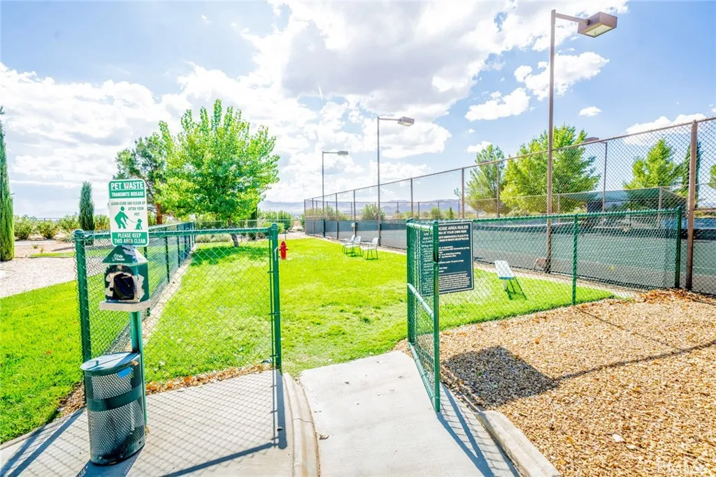 22241 Nisqually Road, Unit 153 Apple Valley, CA 92307 - Photo 48 of 55 a view of a backyard