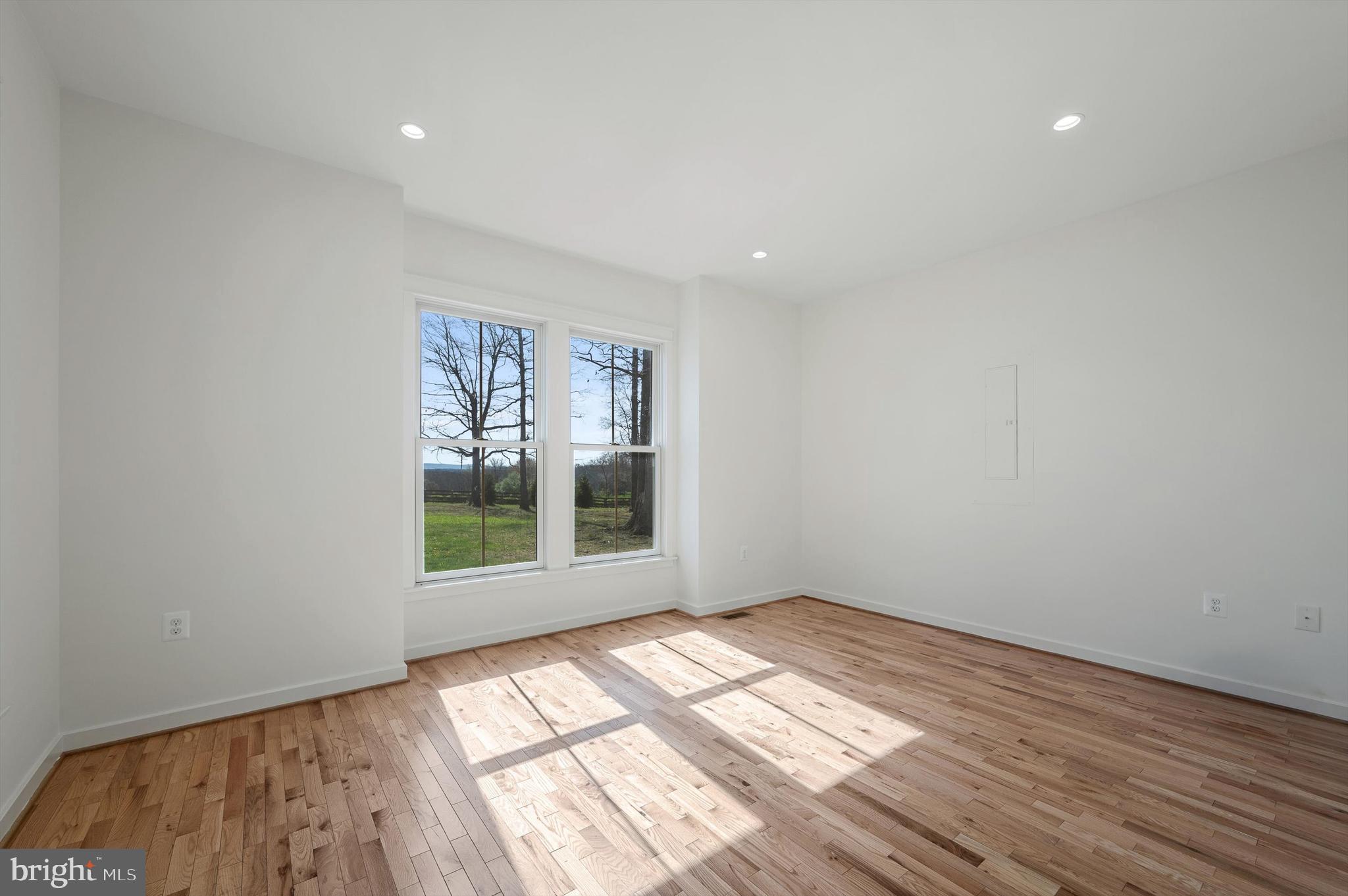 105 Loretto Drive Clear Brook, VA 22624 - Photo 23 of 65 wooden floor in an empty room with a window