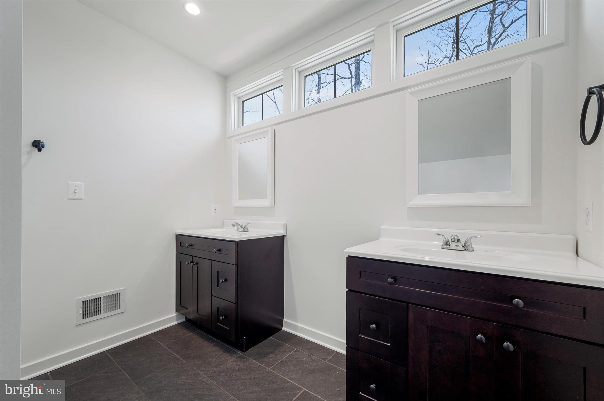 105 Loretto Drive Clear Brook, VA 22624 - Photo 29 of 65 a room with a sink and a mirror