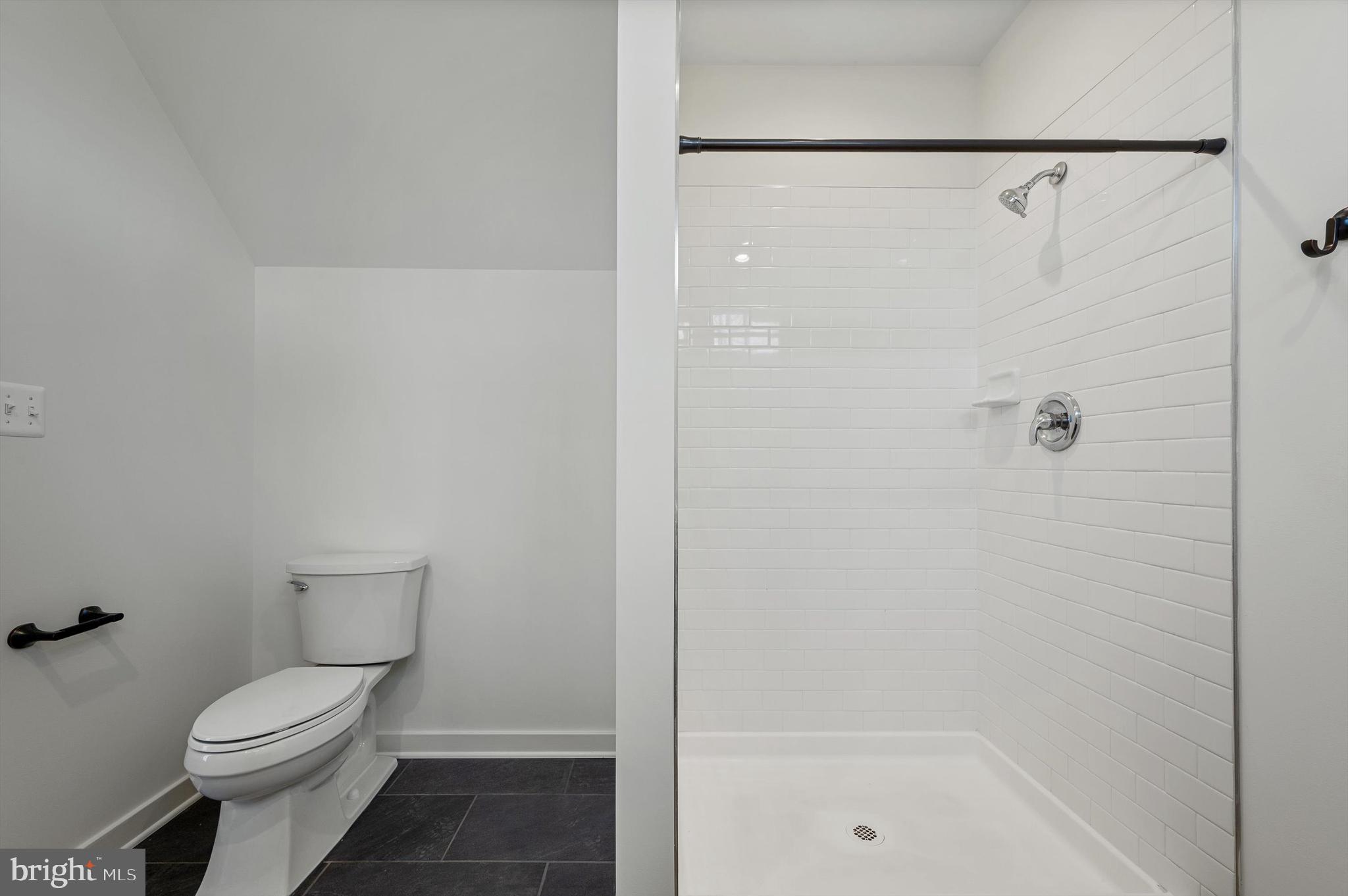 105 Loretto Drive Clear Brook, VA 22624 - Photo 30 of 65 a bathroom with a shower and a toilet
