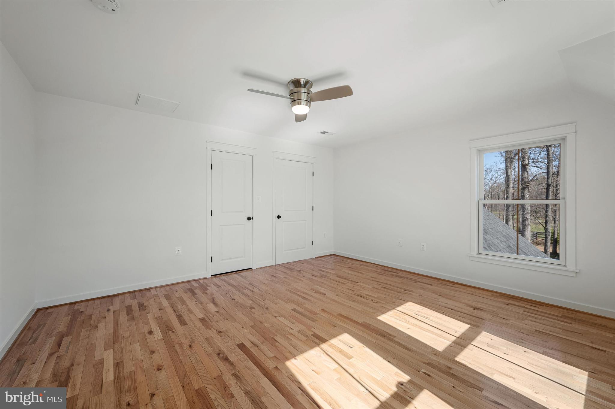 105 Loretto Drive Clear Brook, VA 22624 - Photo 35 of 65 wooden floor in an empty room with a window