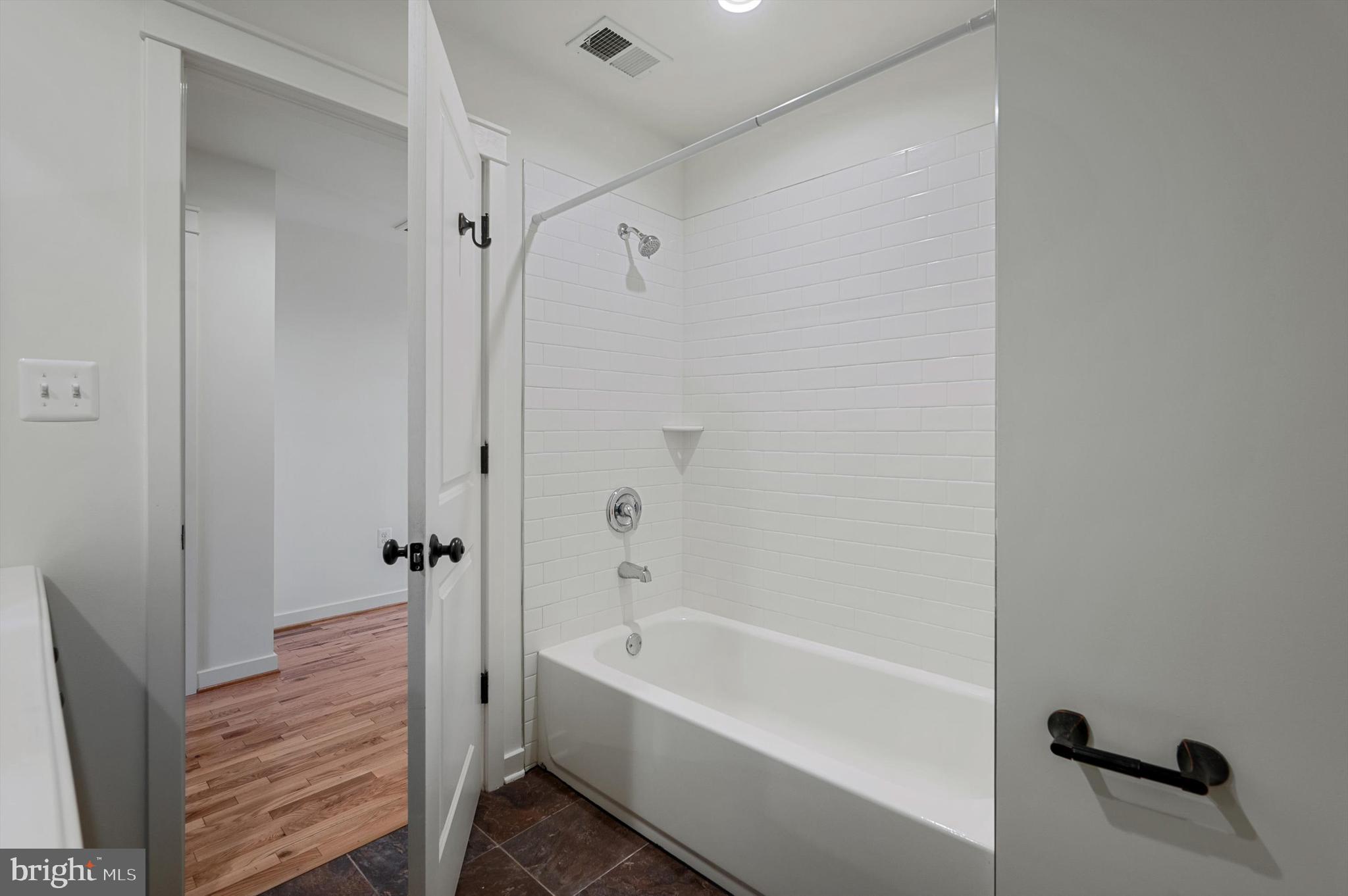 105 Loretto Drive Clear Brook, VA 22624 - Photo 40 of 65 a bathroom with a bathtub and shower