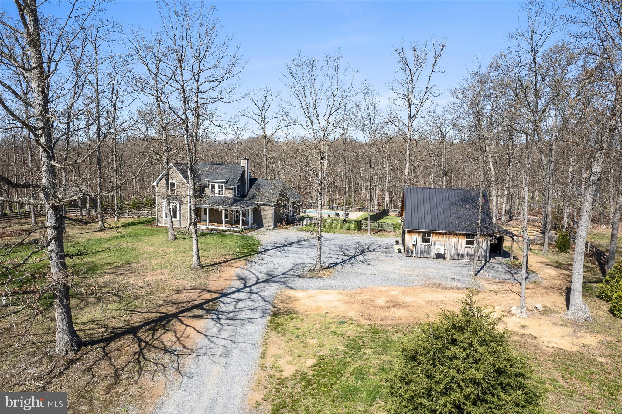 105 Loretto Drive Clear Brook, VA 22624 - Photo 58 of 65 a view of a house with a yard and sitting area
