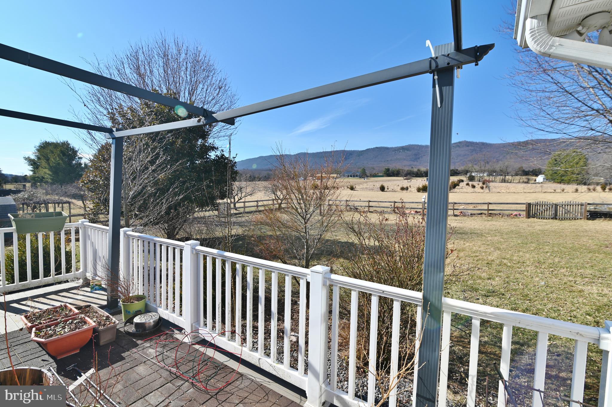 8289 Back Road Maurertown, VA 22644 - Photo 24 of 59 a view of a balcony with wooden floor