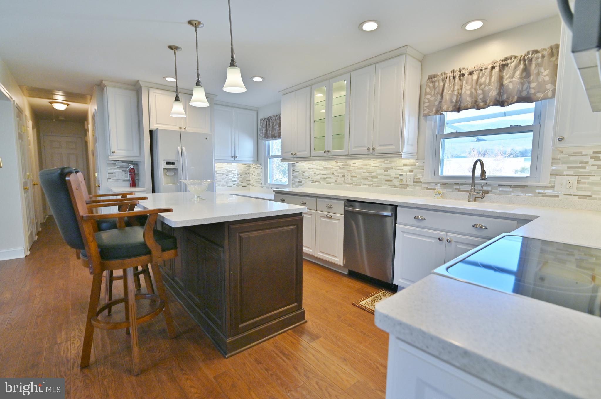 8289 Back Road Maurertown, VA 22644 - Photo 27 of 59 a kitchen with a sink a counter top space and appliances
