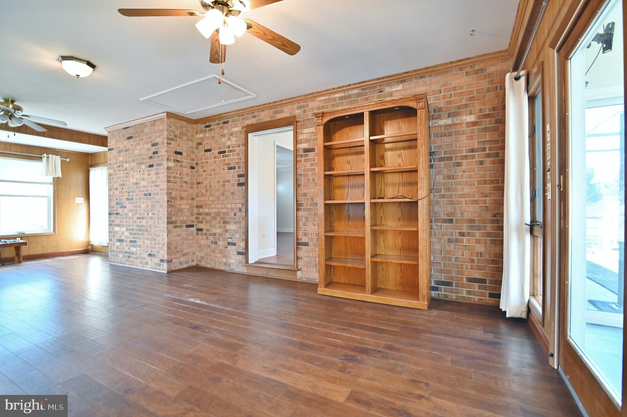 8289 Back Road Maurertown, VA 22644 - Photo 36 of 59 wooden floor in an empty room with a window