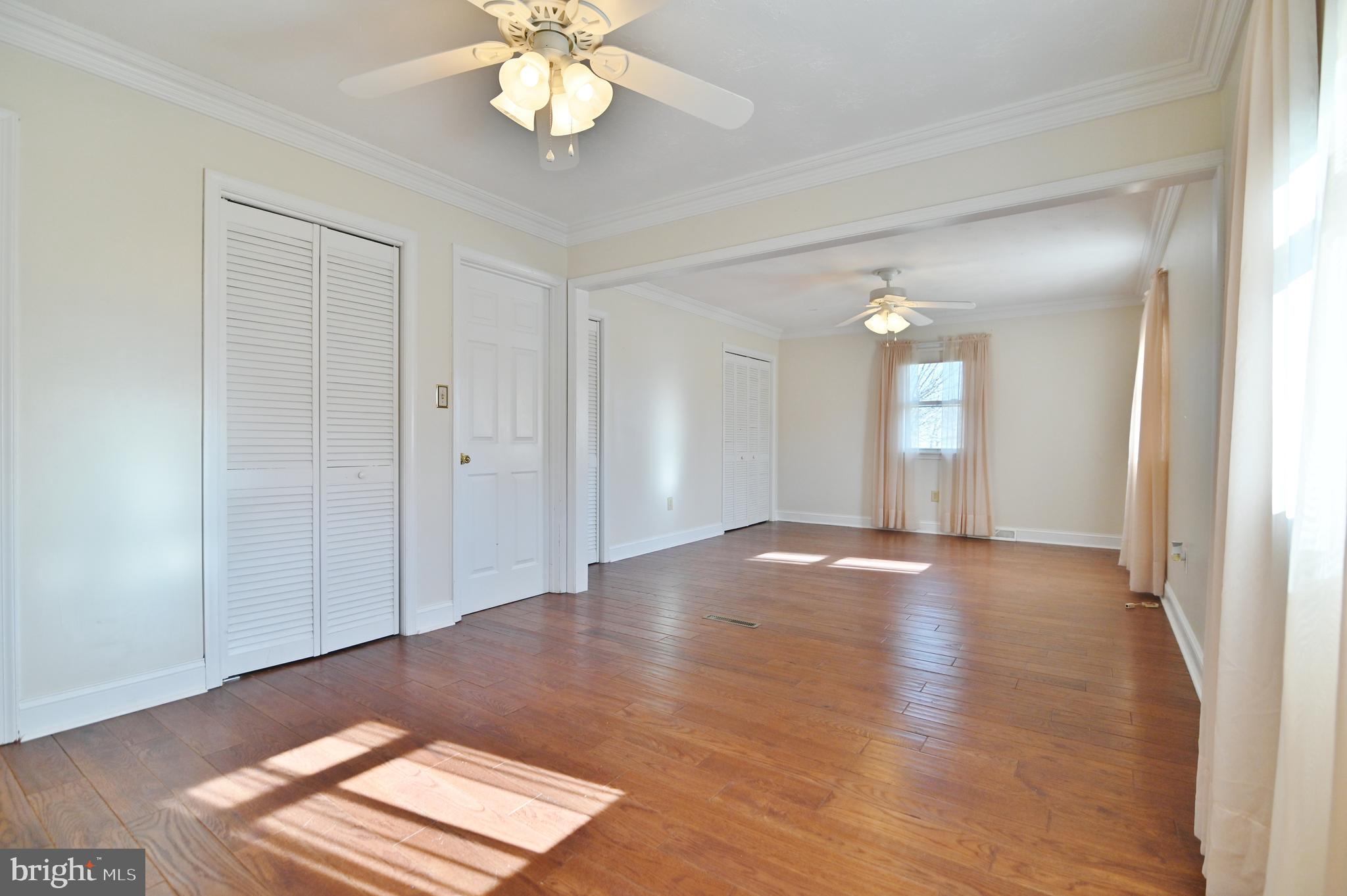 8289 Back Road Maurertown, VA 22644 - Photo 39 of 59 a view of an empty room with wooden floor and a window