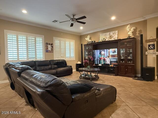 16121 West Berkeley Road Goodyear, AZ 85395 - Photo 7 of 20 a living room with furniture and a large window