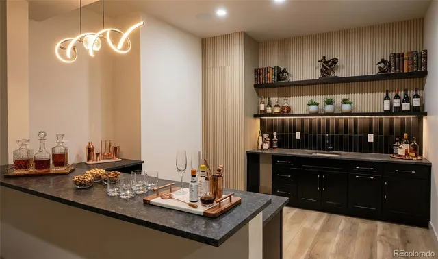 a bathroom with a double vanity sink mirror and toilet