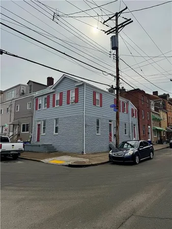 a view of a street with cars