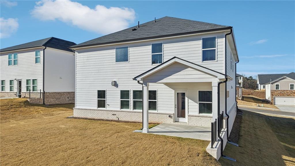 391 Tallulah Lane Grayson, GA 30017 - Photo 32 of 35 a view of a house with wooden fence