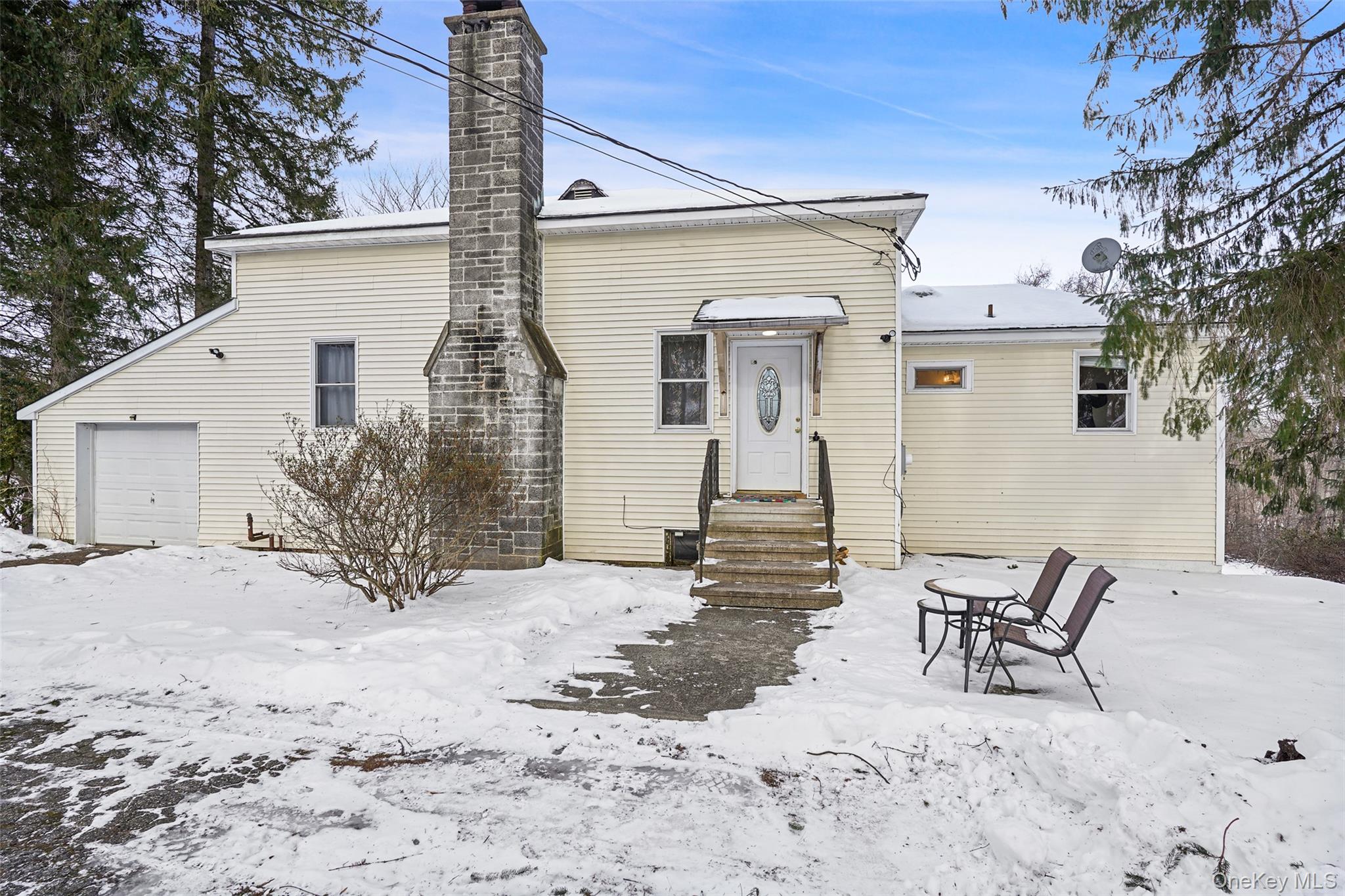 22 Raspberry Lane Carmel, NY 10512 - Photo 1 of 23 a view of a house with backyard and sitting area