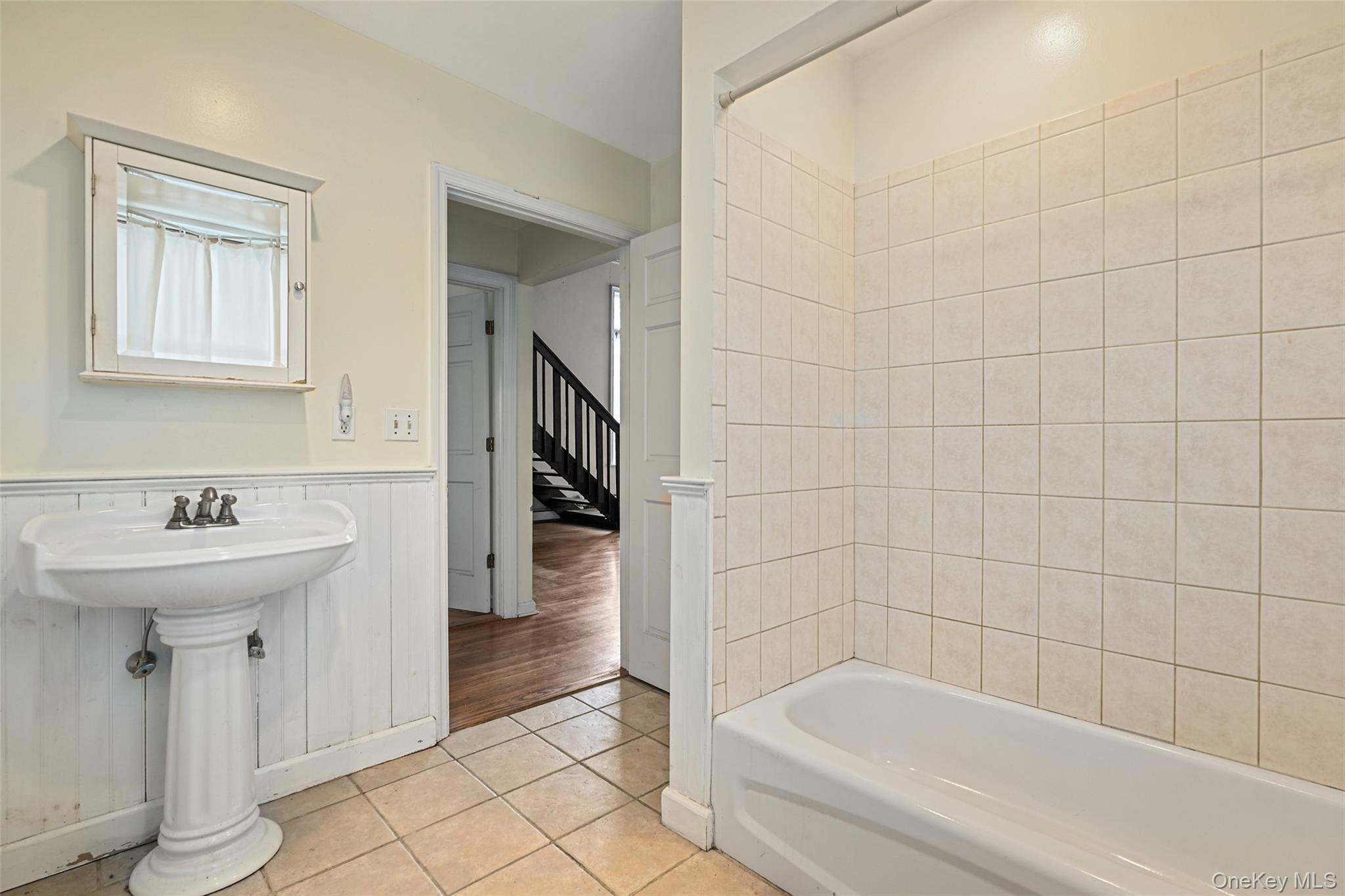 22 Raspberry Lane Carmel, NY 10512 - Photo 12 of 23 a bathroom with a sink a toilet and shower