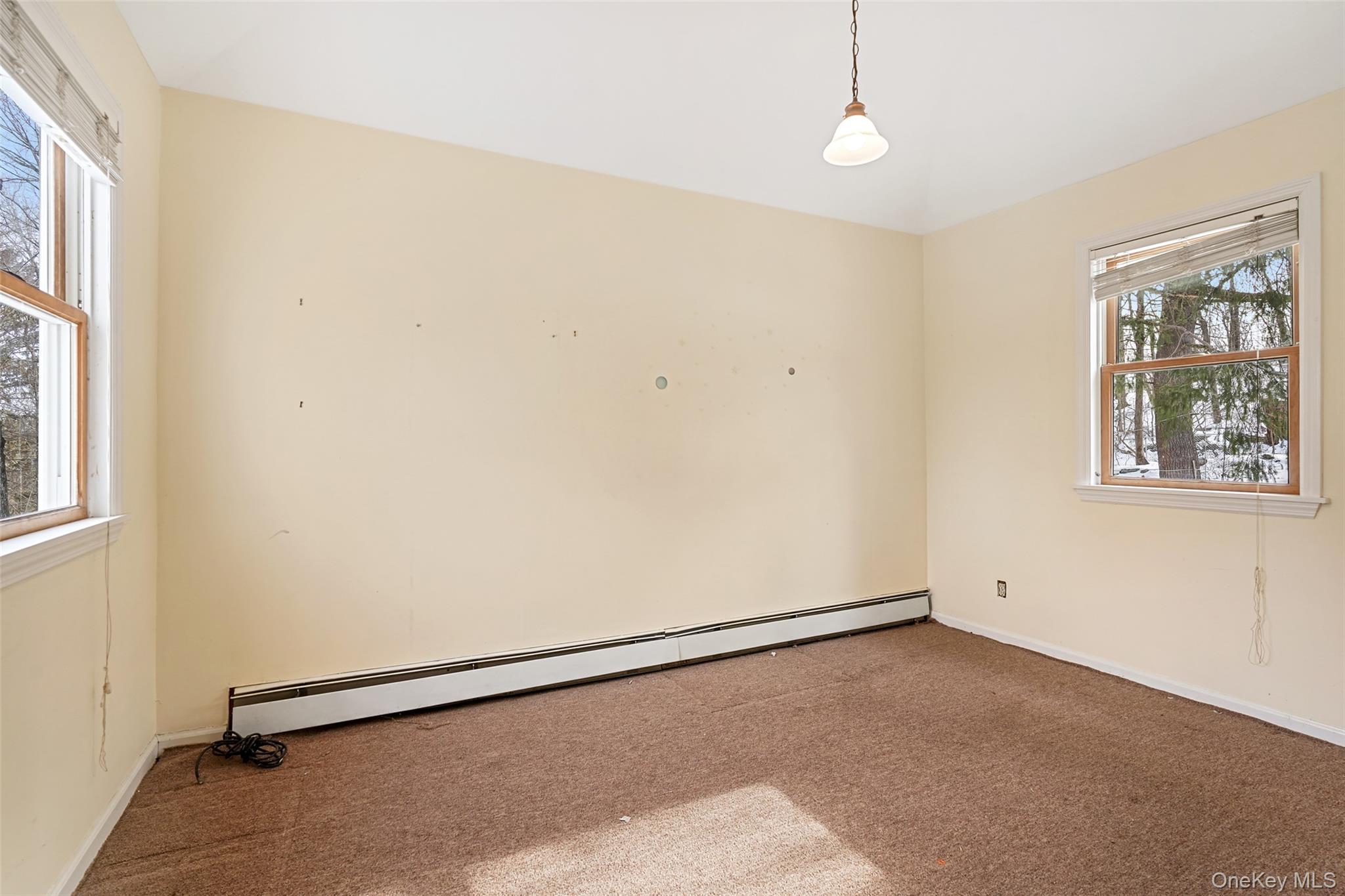 22 Raspberry Lane Carmel, NY 10512 - Photo 14 of 23 an empty room with windows