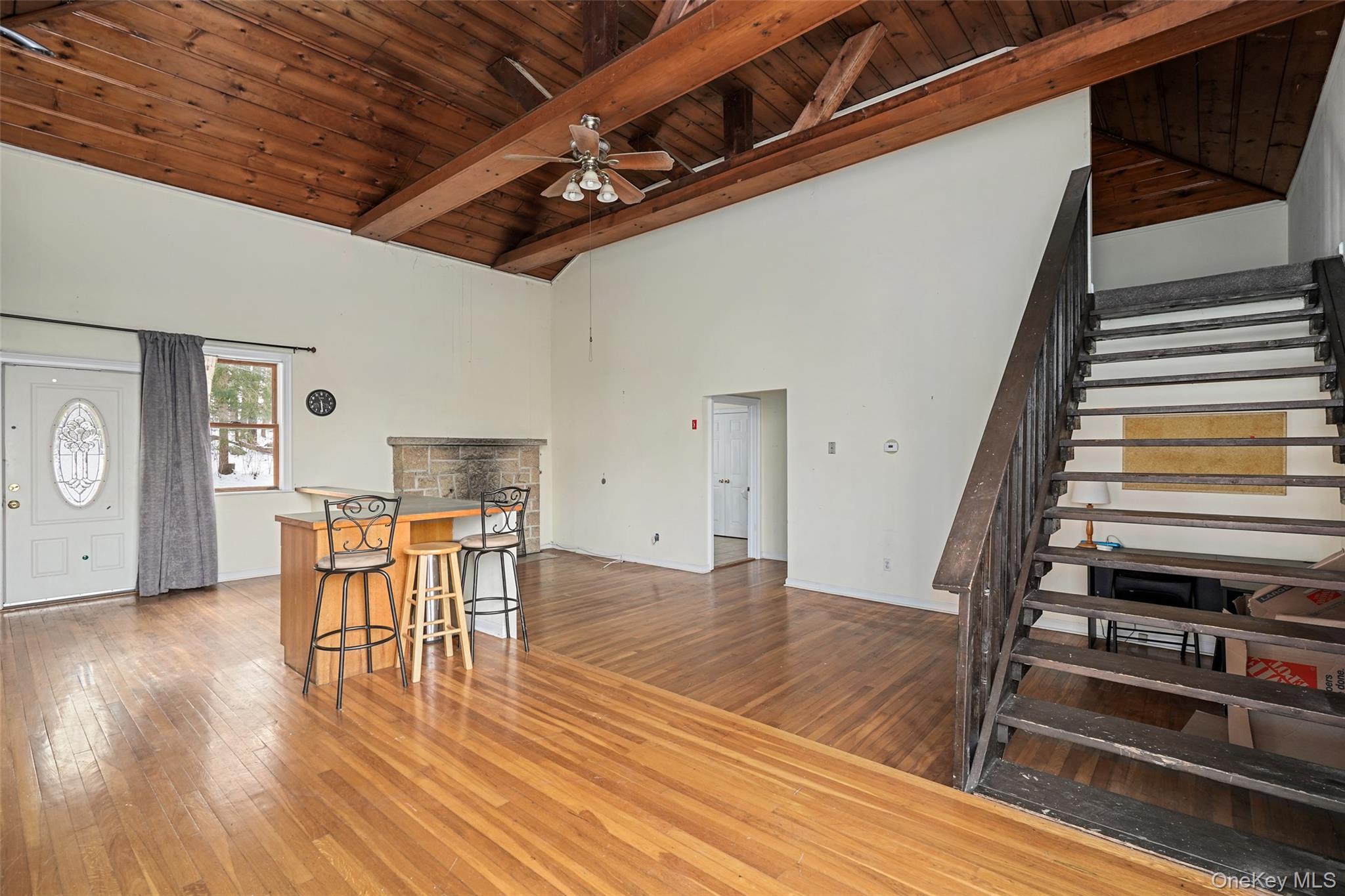 22 Raspberry Lane Carmel, NY 10512 - Photo 4 of 23 a view of a dining room with furniture and wooden floor