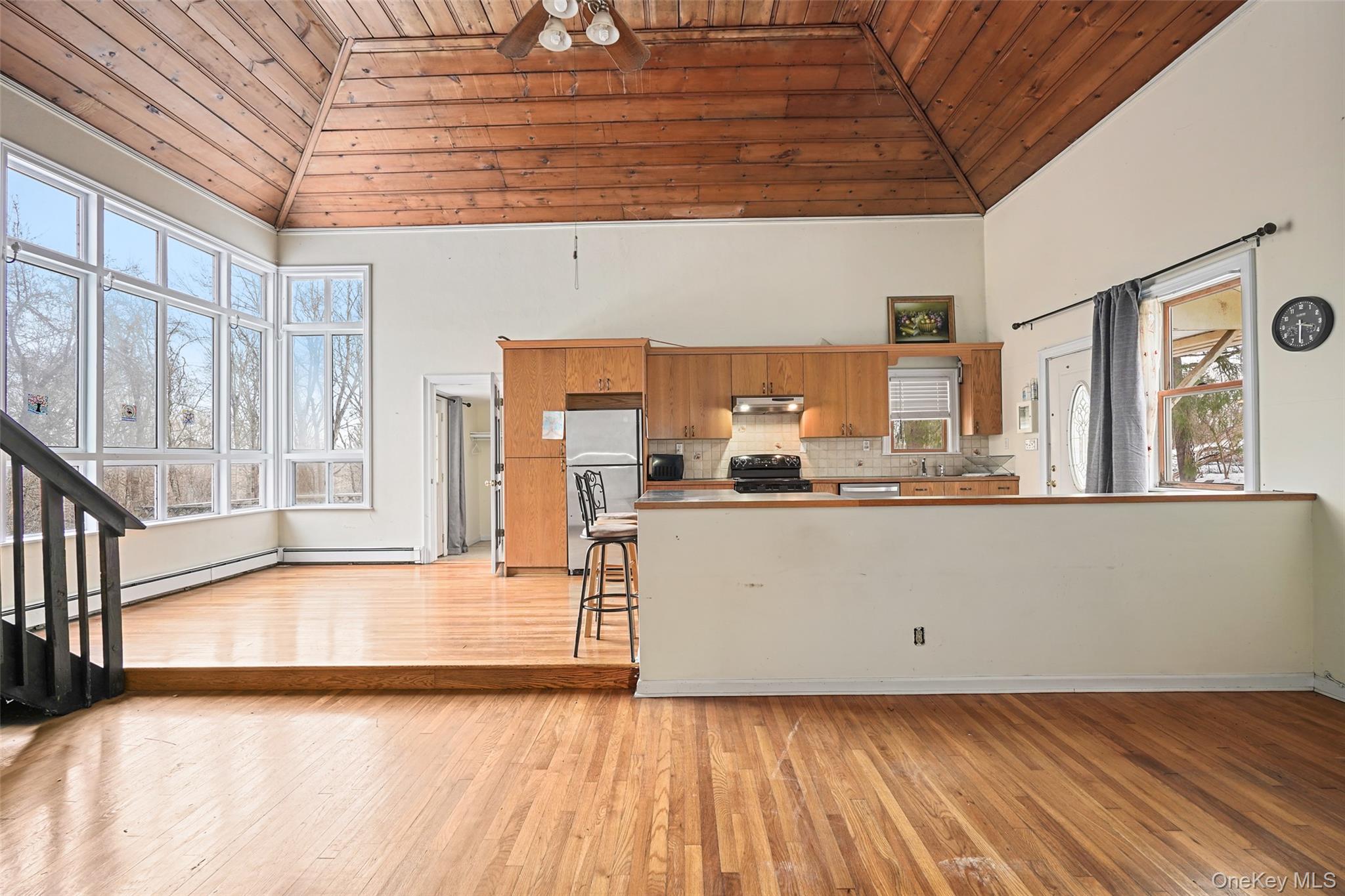 22 Raspberry Lane Carmel, NY 10512 - Photo 7 of 23 a view of a kitchen with wooden floor and staircase