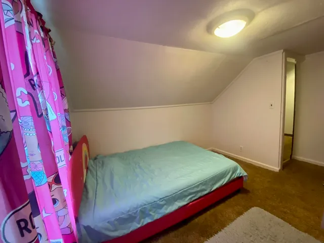 a view of a backyard of a house