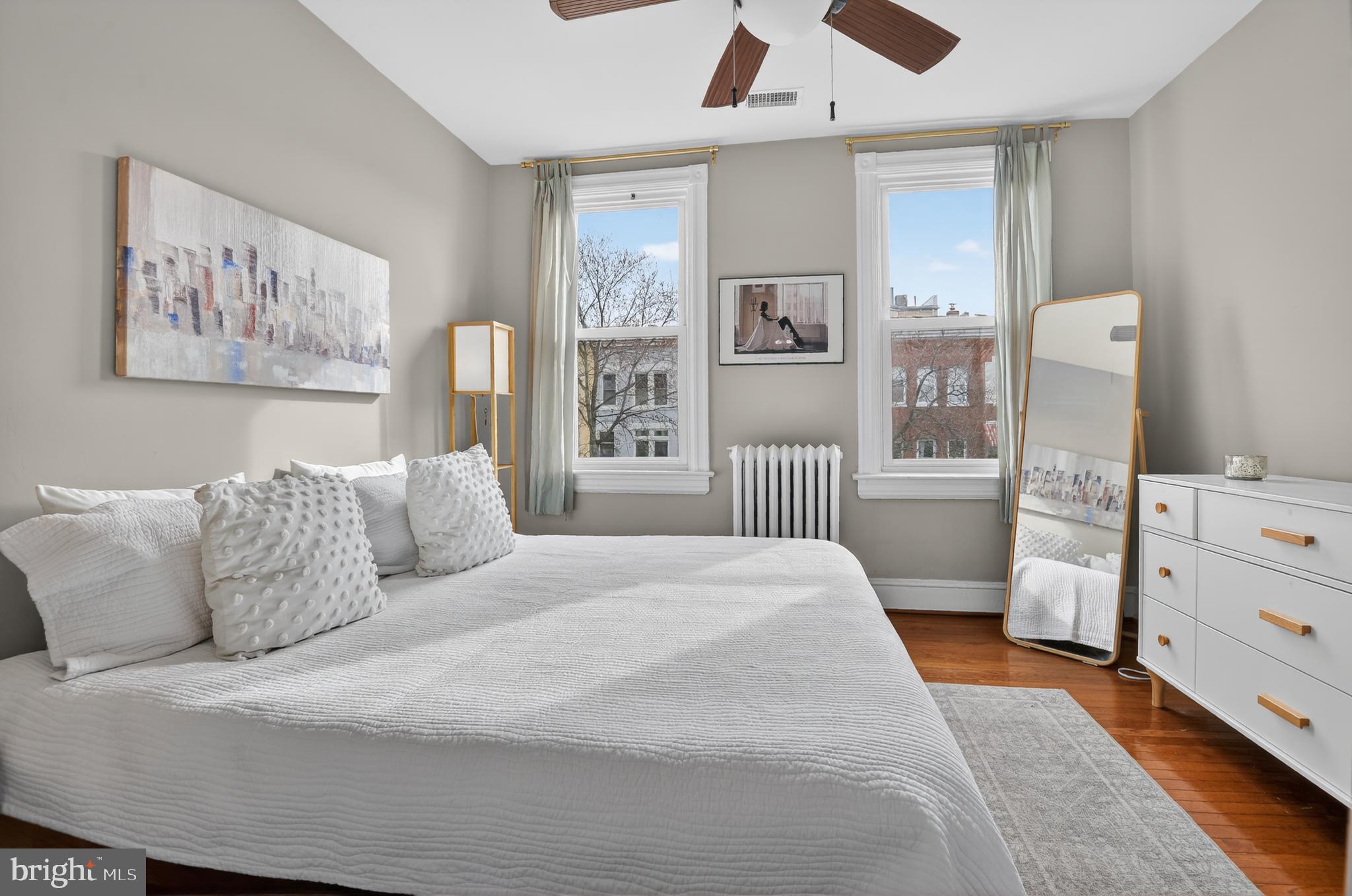 315 16th Street Southeast Washington, DC 20003 - Photo 14 of 21 a bed room with a bed and a window