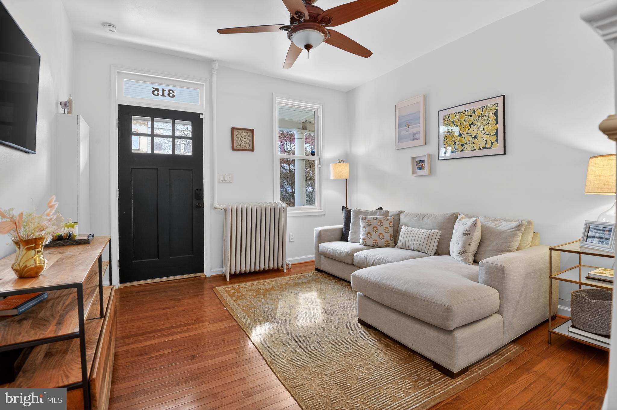 315 16th Street Southeast Washington, DC 20003 - Photo 6 of 21 a living room with furniture and wooden floor