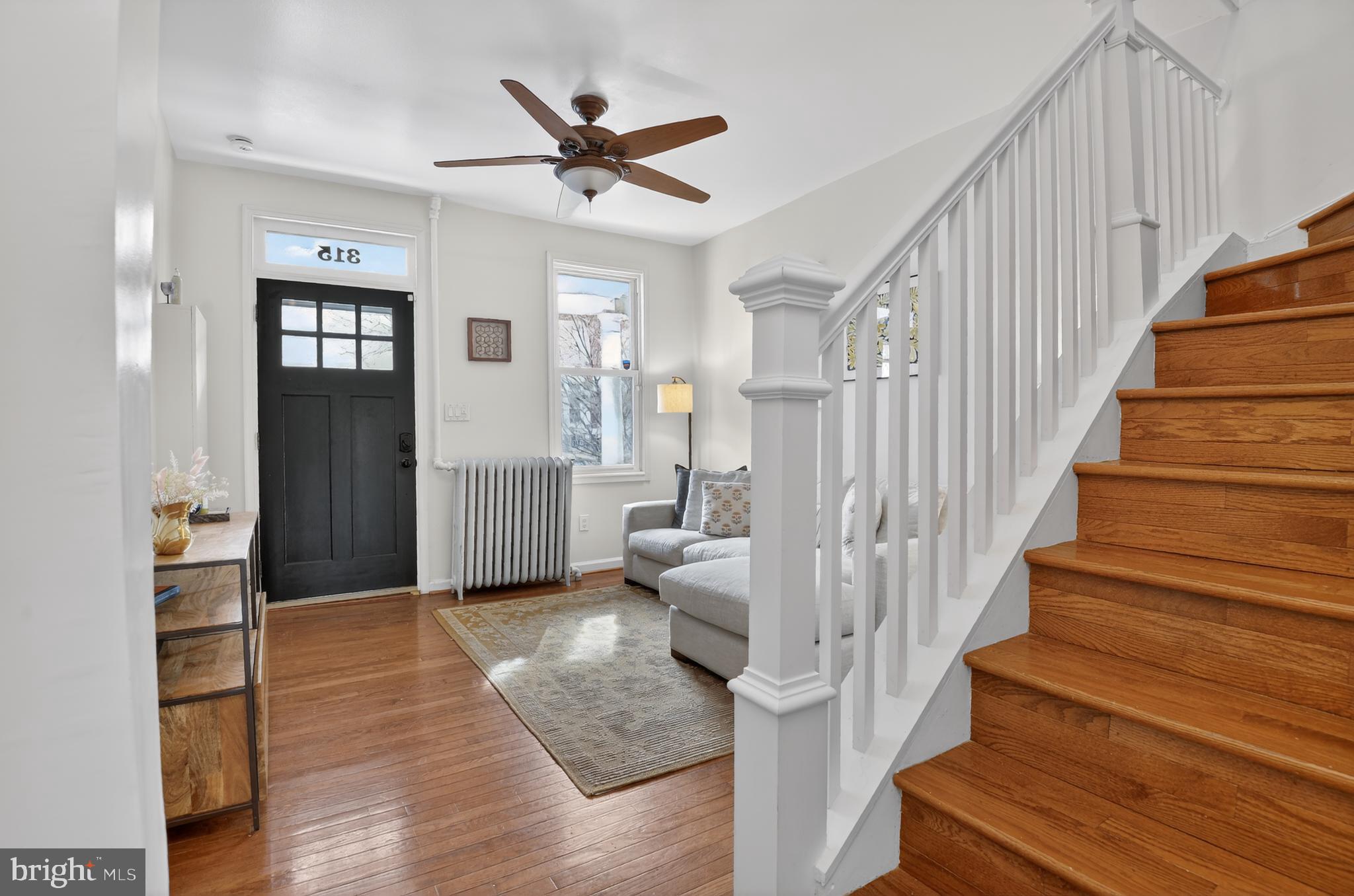 315 16th Street Southeast Washington, DC 20003 - Photo 7 of 21 a living room with wooden floor and furniture