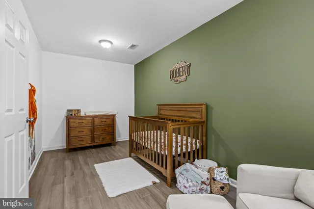 a bedroom with a couch and a couch