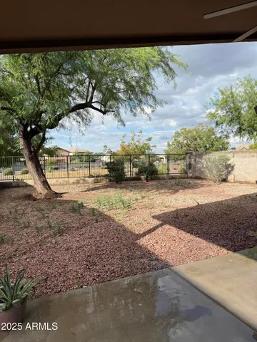 a view of a yard with an outdoor space