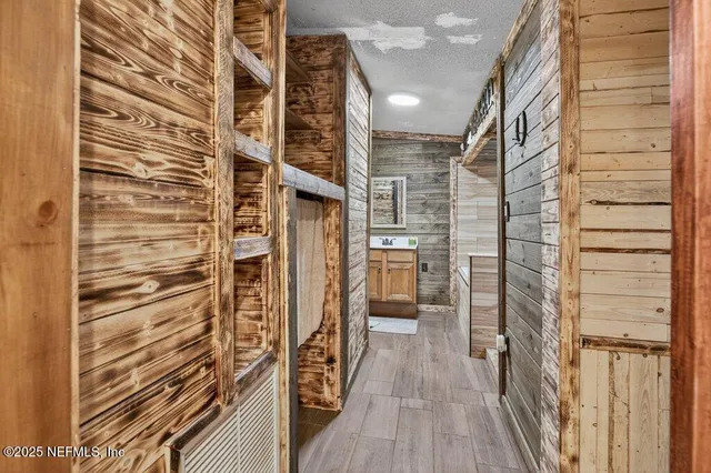 a view of a patio with wooden floor