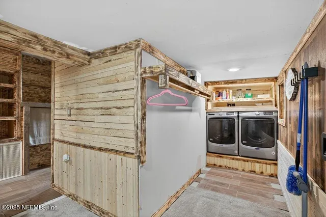 a view of a porch with wooden floor and roof