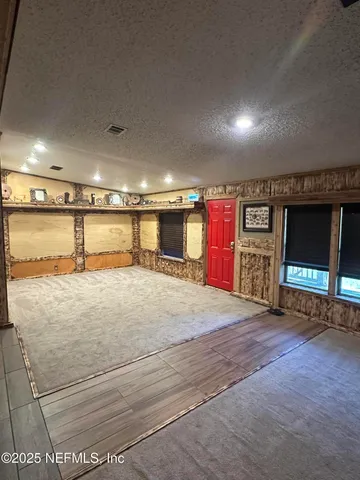 a view of a livingroom with furniture