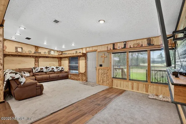 a view of lake with green space