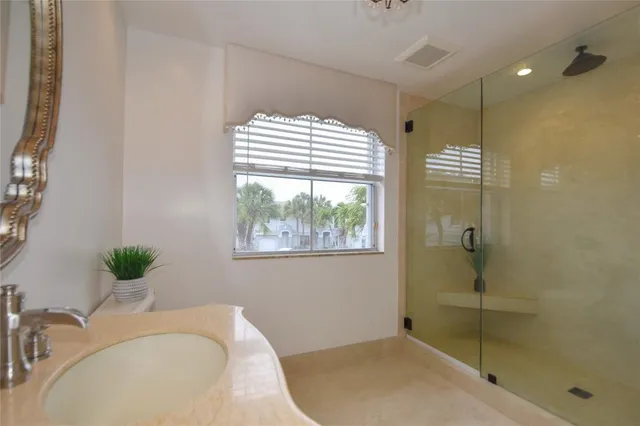 a bathroom with a bathtub and shower