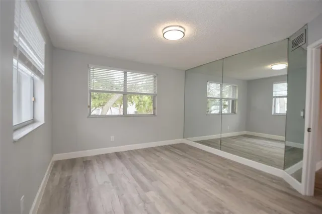 an empty room with windows