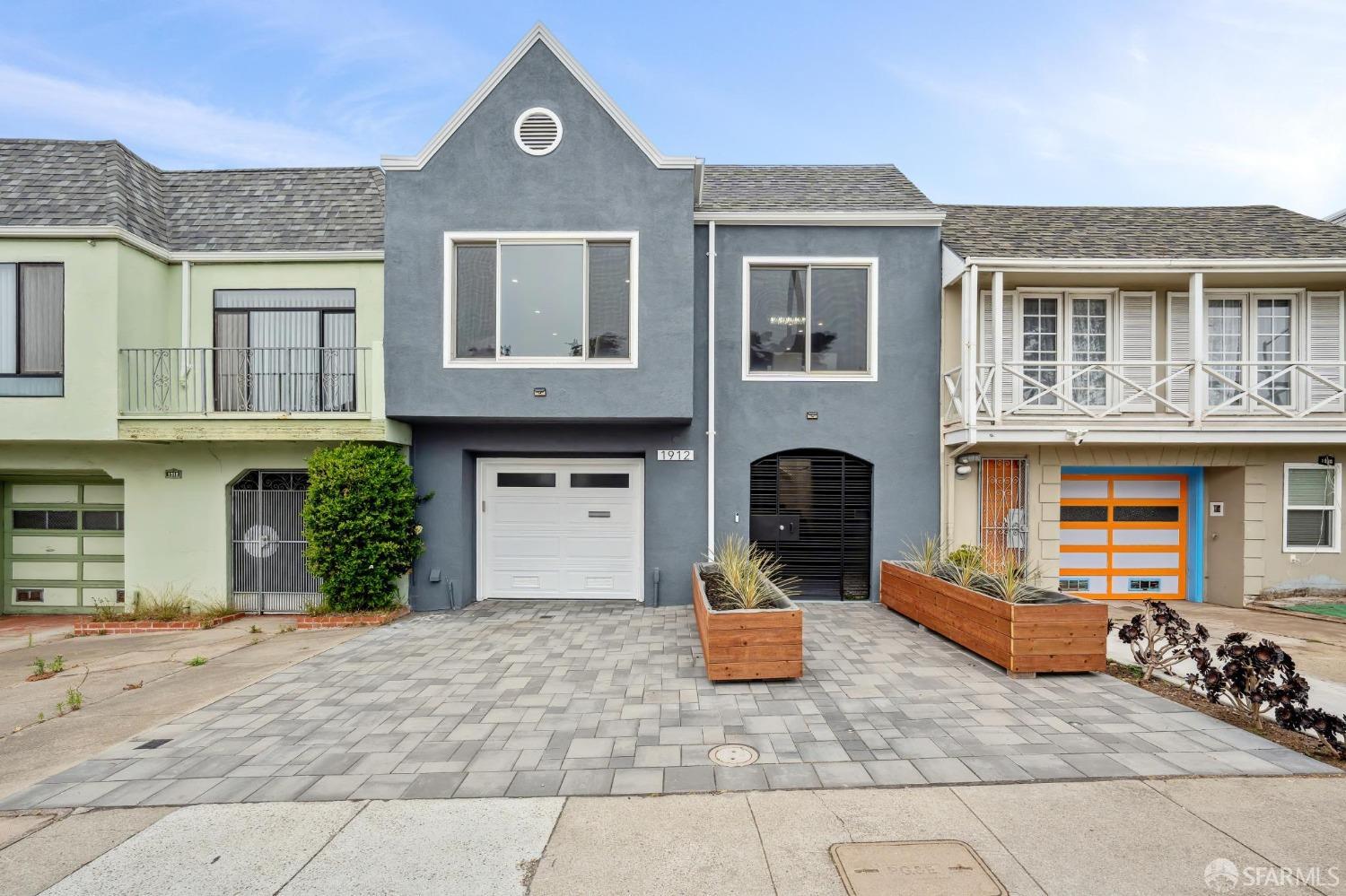 a front view of a house with yard