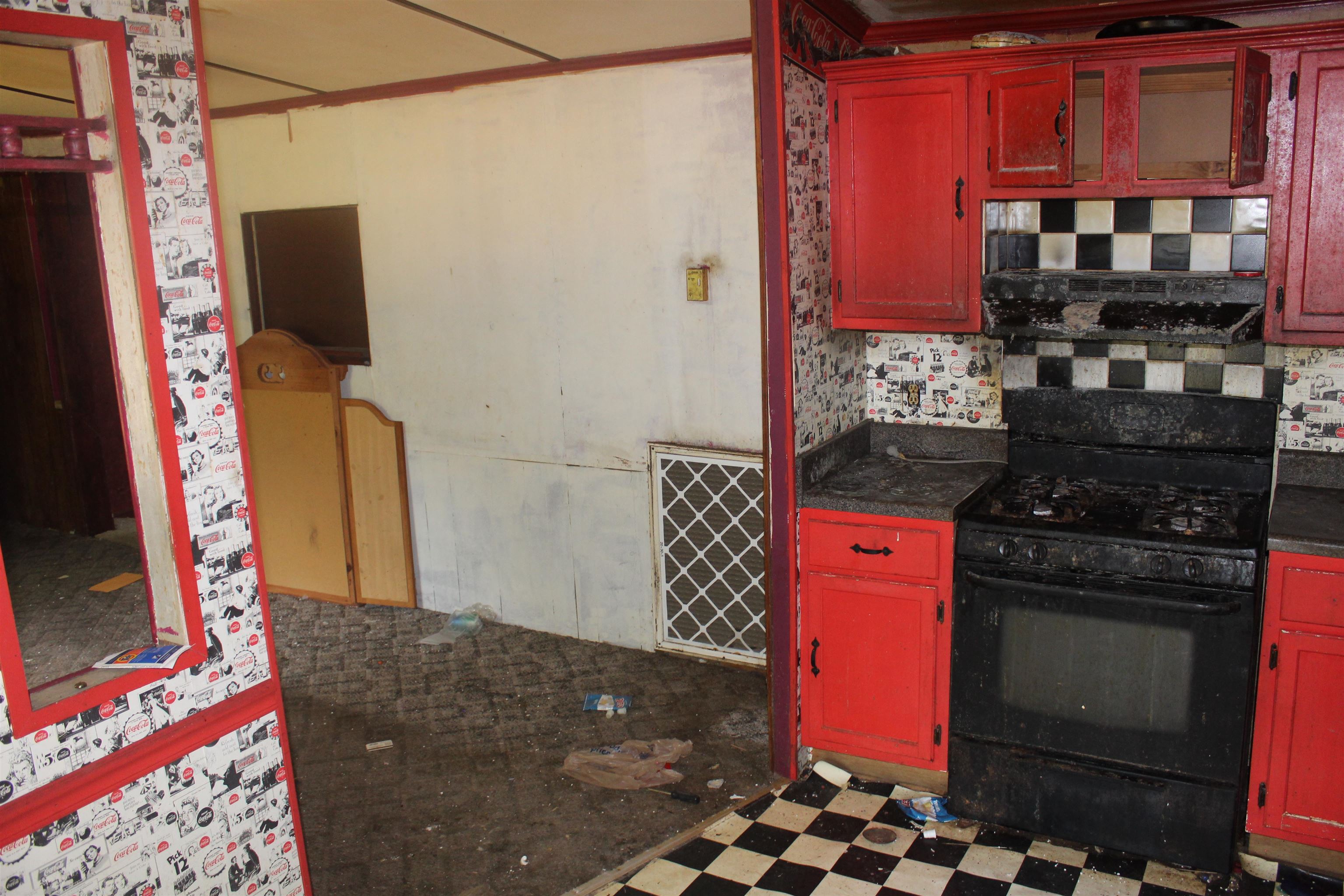 44 Martha Cove Ripley, TN 38063 - Photo 16 of 20 a kitchen with stainless steel appliances granite countertop a stove top oven microwave and cabinets