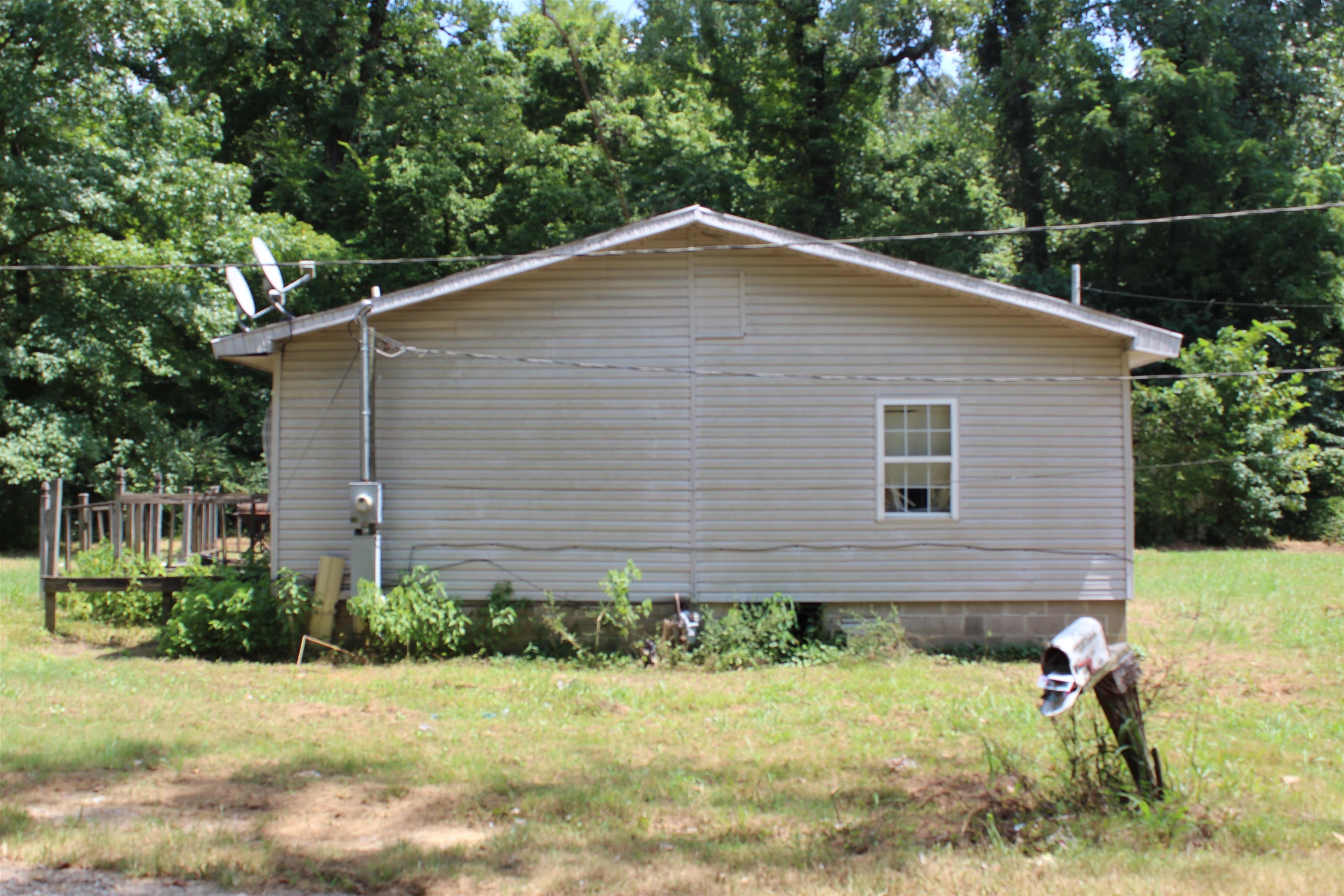 44 Martha Cove Ripley, TN 38063 - Photo 2 of 20 a front view of a house with garden