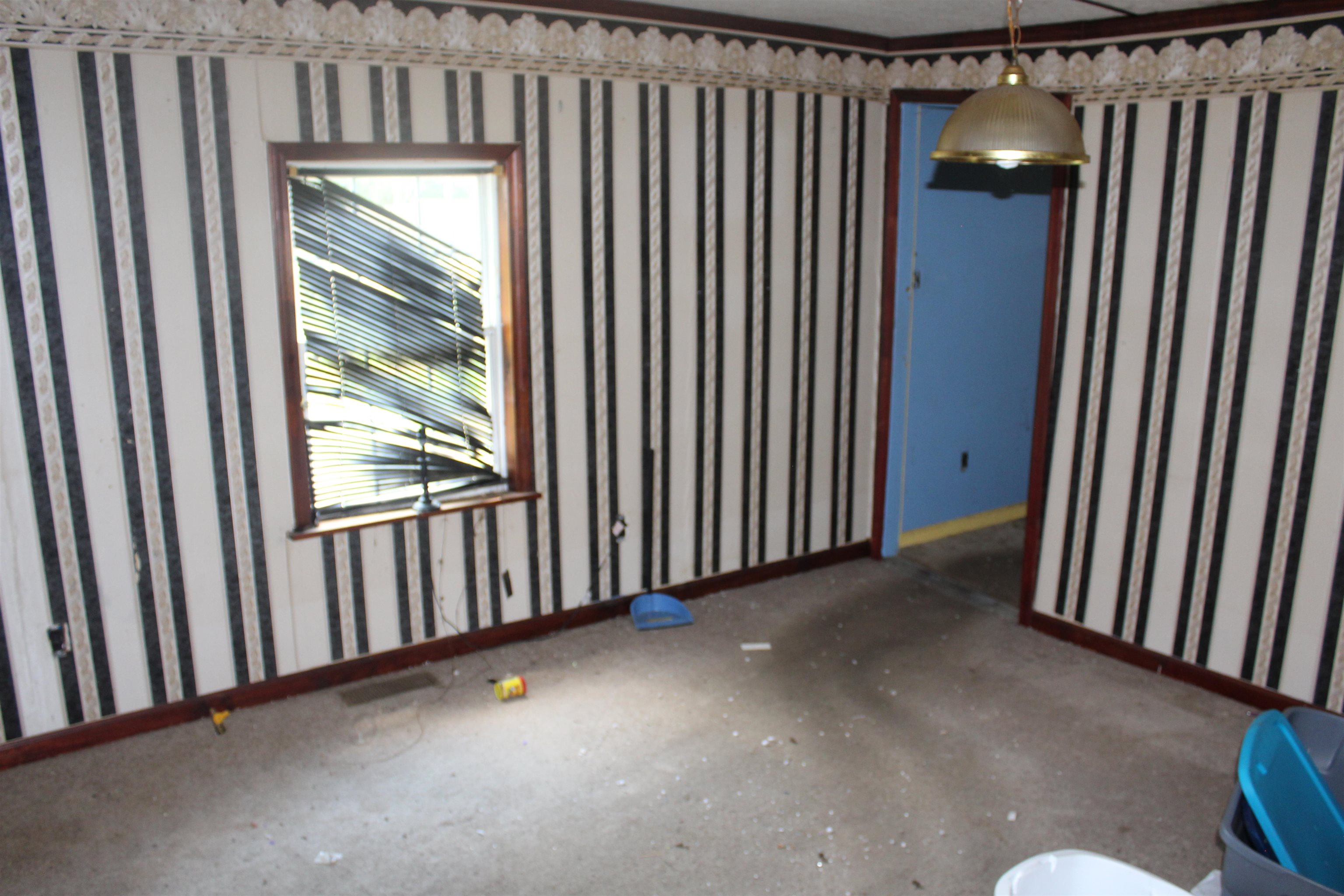 44 Martha Cove Ripley, TN 38063 - Photo 8 of 20 a view of a livingroom with furniture and staircase