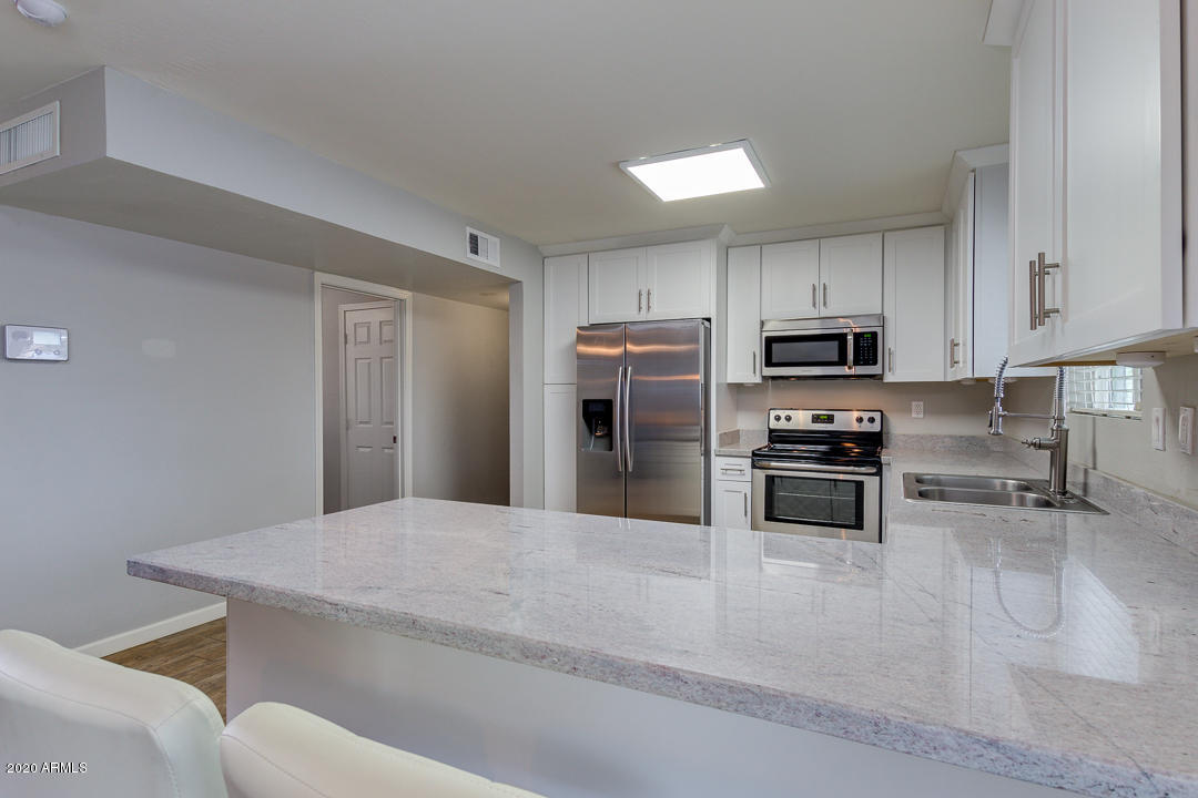 3943 West Griswold Road Phoenix, AZ 85051 - Photo 3 of 29 11-Griswold