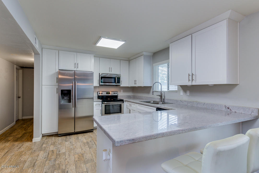 3943 West Griswold Road Phoenix, AZ 85051 - Photo 4 of 29 12-Griswold