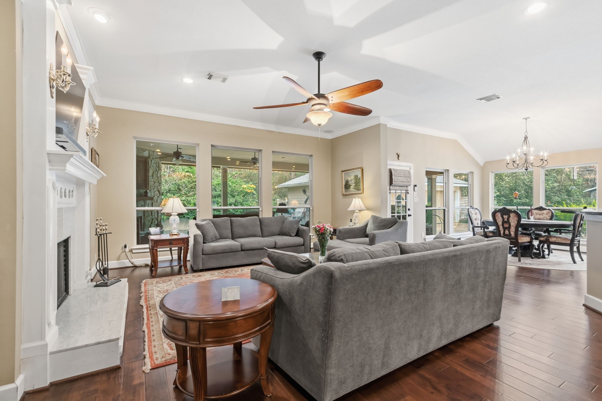 7514 Saddle Blanket Drive Waller, TX 77484 - Photo 13 of 50 The family room is conveniently situated off the kitchen which provides an open feel to these rooms. Large windows overlook the covered patio and pool. Cozy fireplace for those cold days. Lighted built-ins are featured and are the perfect place to display your art pieces and pictures.