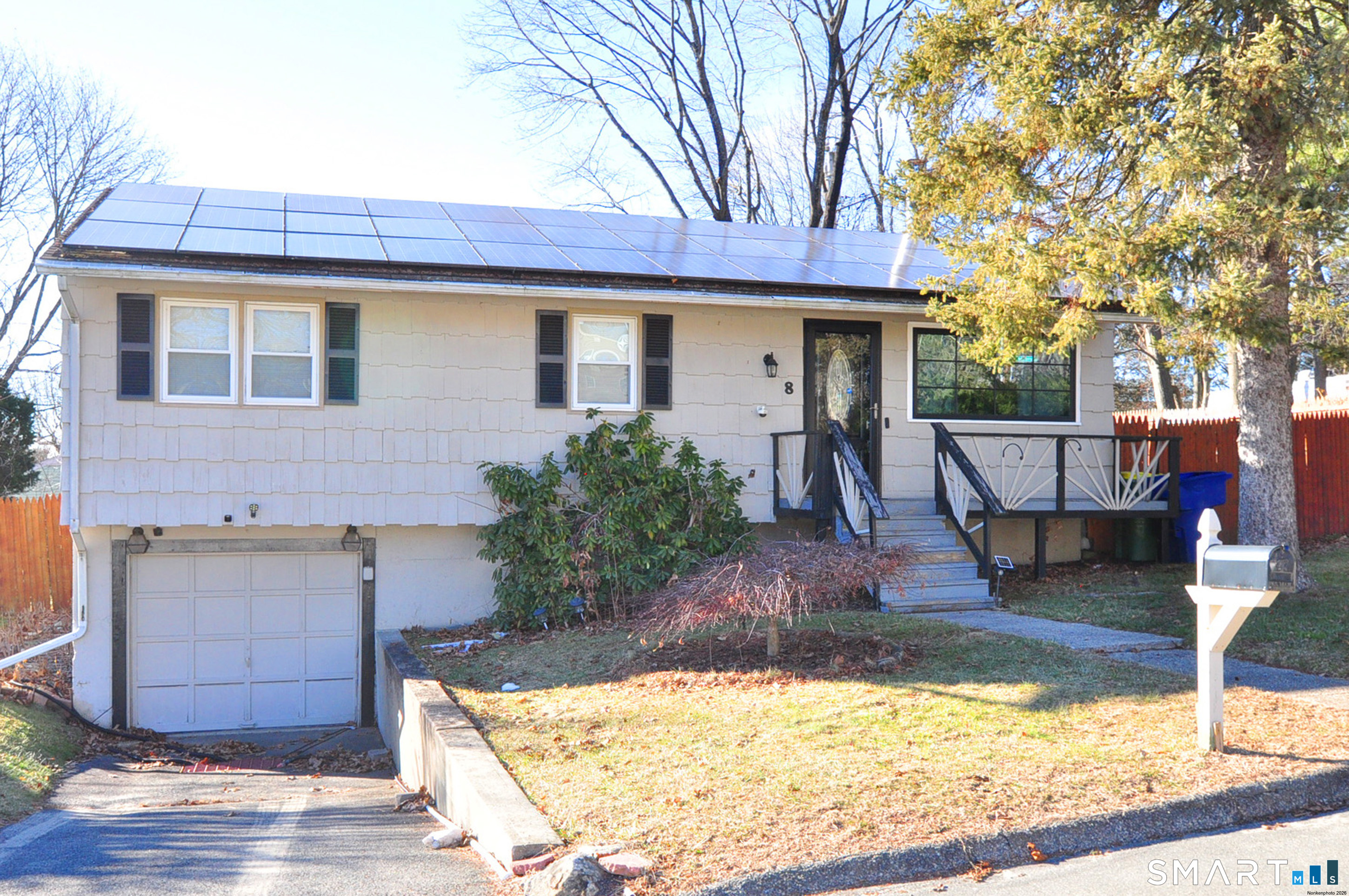 a view of a fountain with brick walls