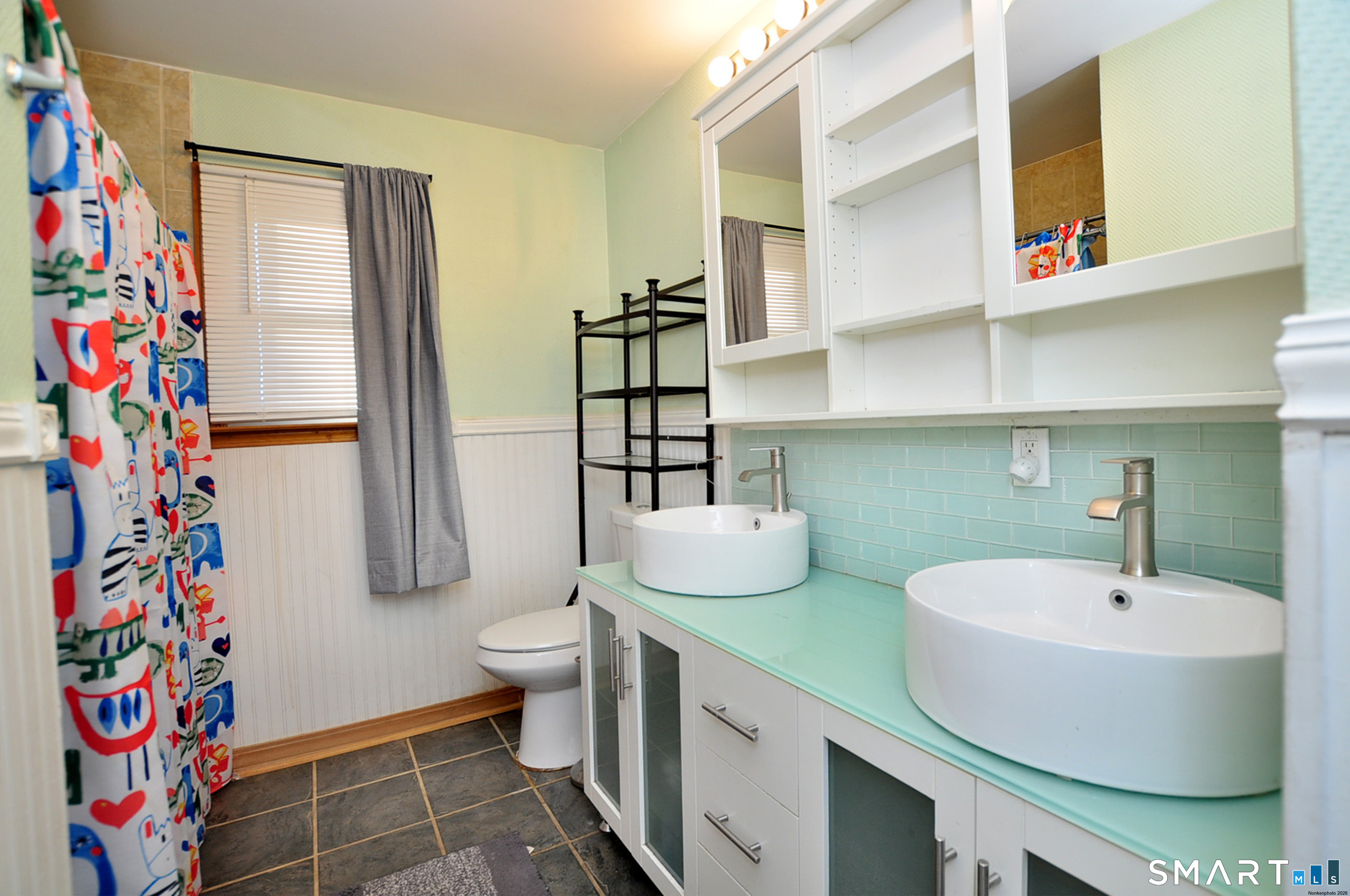 8 Cornfield Road Waterbury, CT 06704 - Photo 20 of 39 a bathroom with a sink toilet and shower