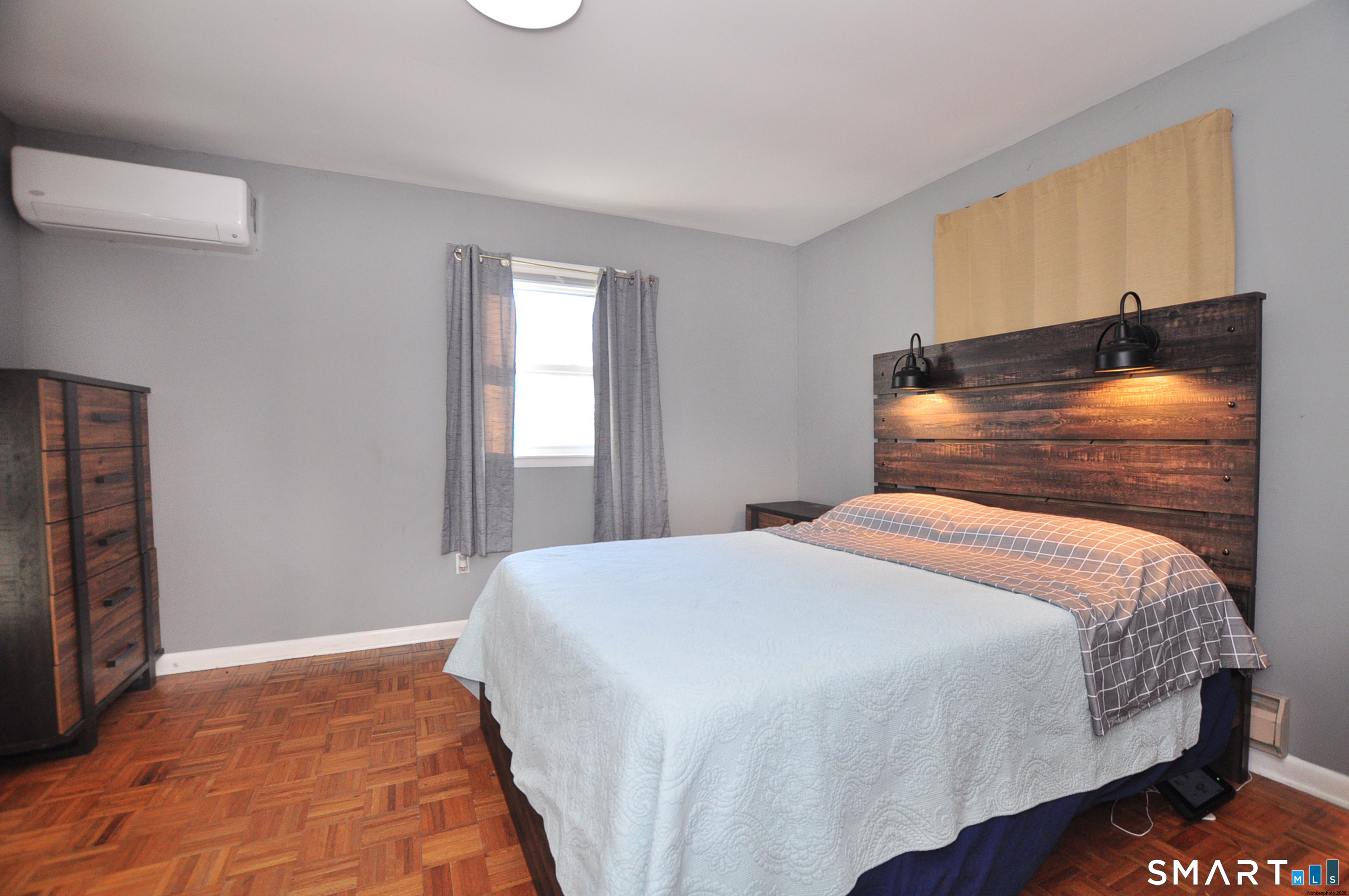 8 Cornfield Road Waterbury, CT 06704 - Photo 23 of 39 a bedroom with a bed and a tv