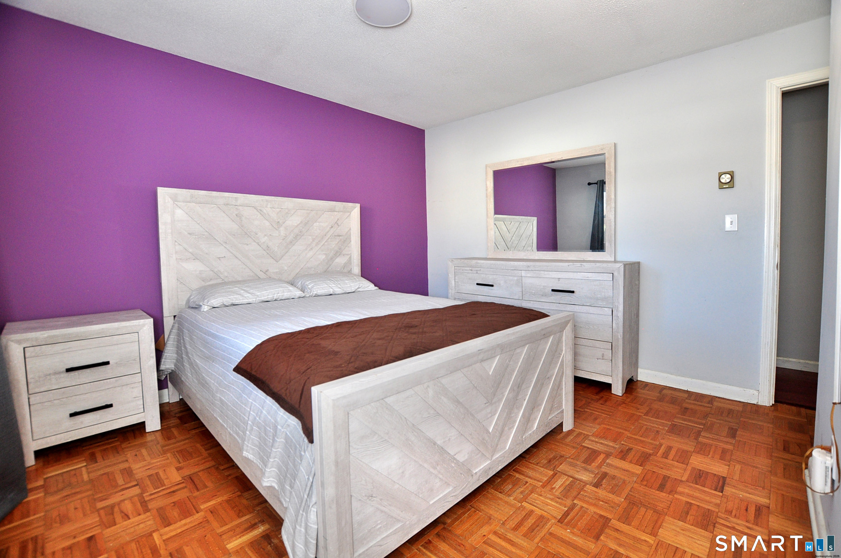 8 Cornfield Road Waterbury, CT 06704 - Photo 28 of 39 a bedroom with a bed and a dresser