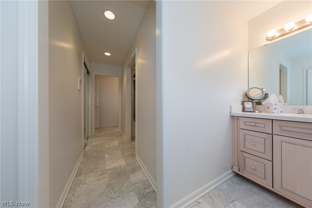 17511 Rapids Road Burton, OH 44021 - Photo 24 of 35 Marble floor in the Jack and Jill bathroom with two vanities.