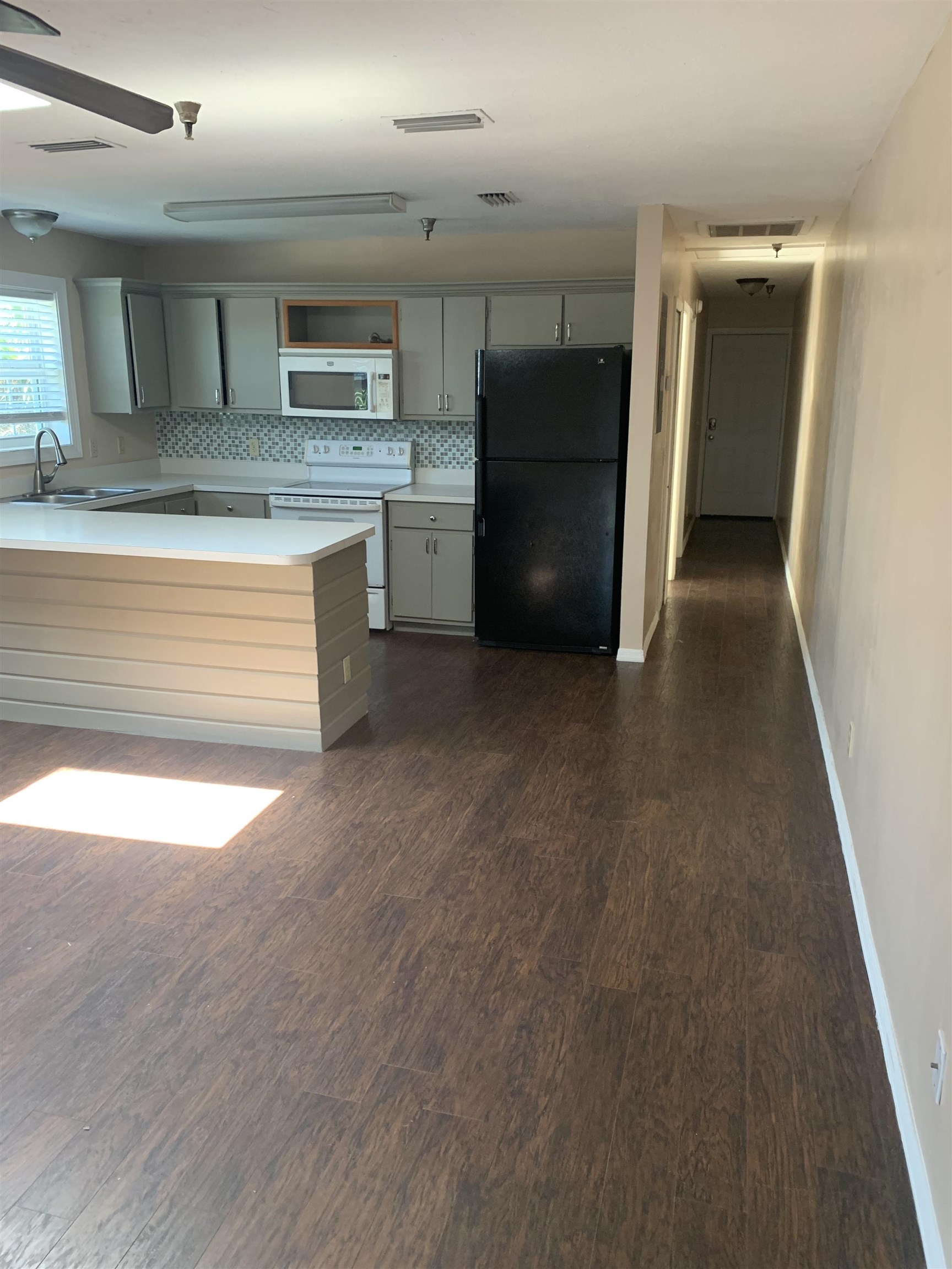 6225 A1A South, Unit D St. Augustine, FL 32080 - Photo 2 of 11 a view of a kitchen with a sink