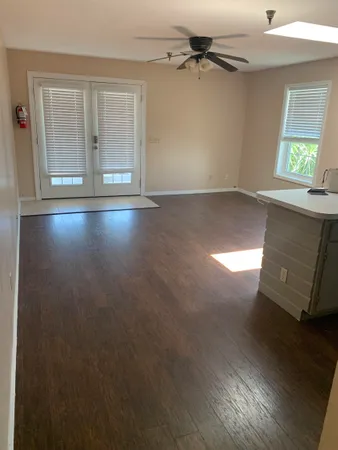 an empty room with windows