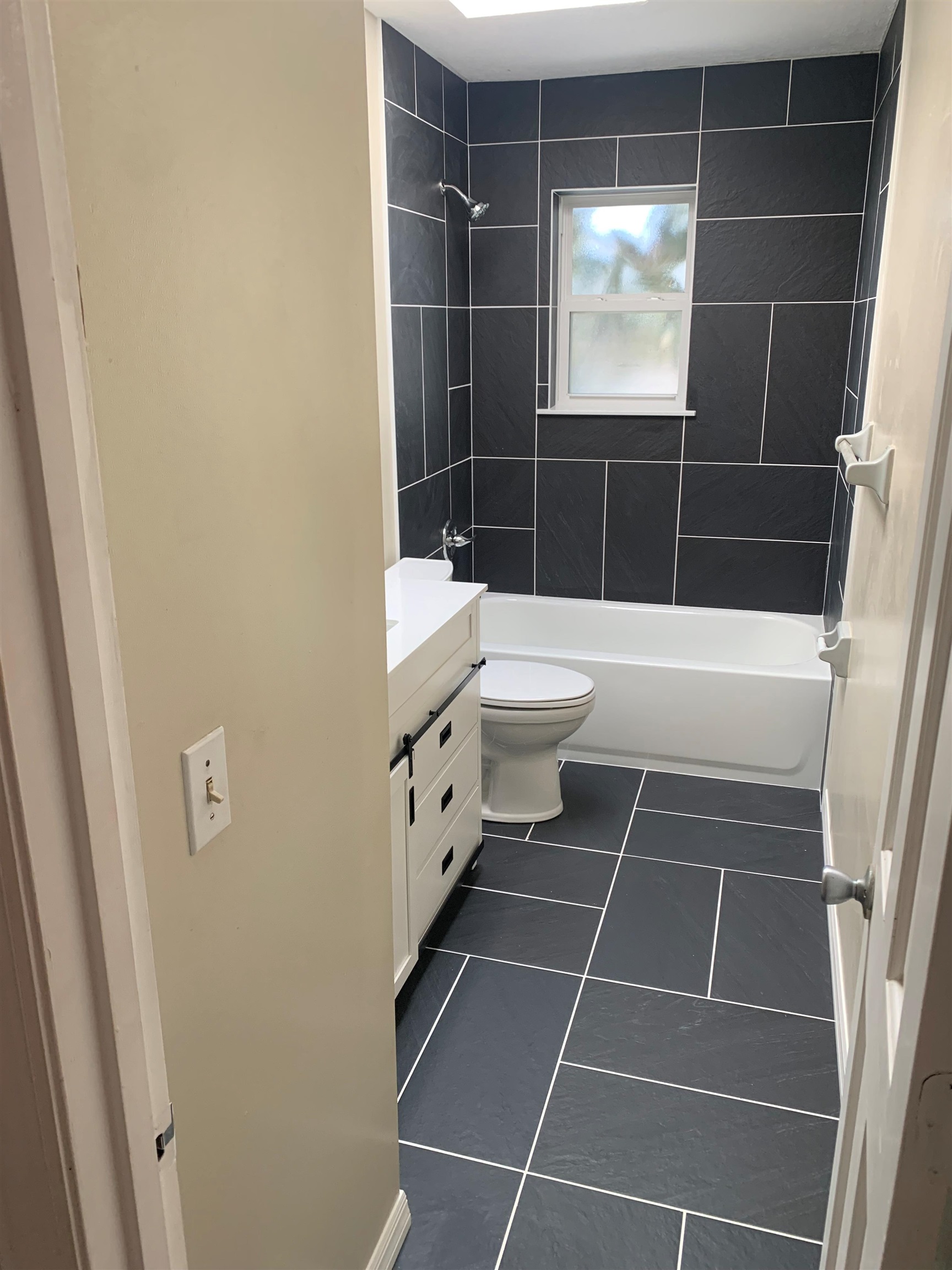 6225 A1A South, Unit D St. Augustine, FL 32080 - Photo 6 of 11 a bathroom with a toilet and a shower